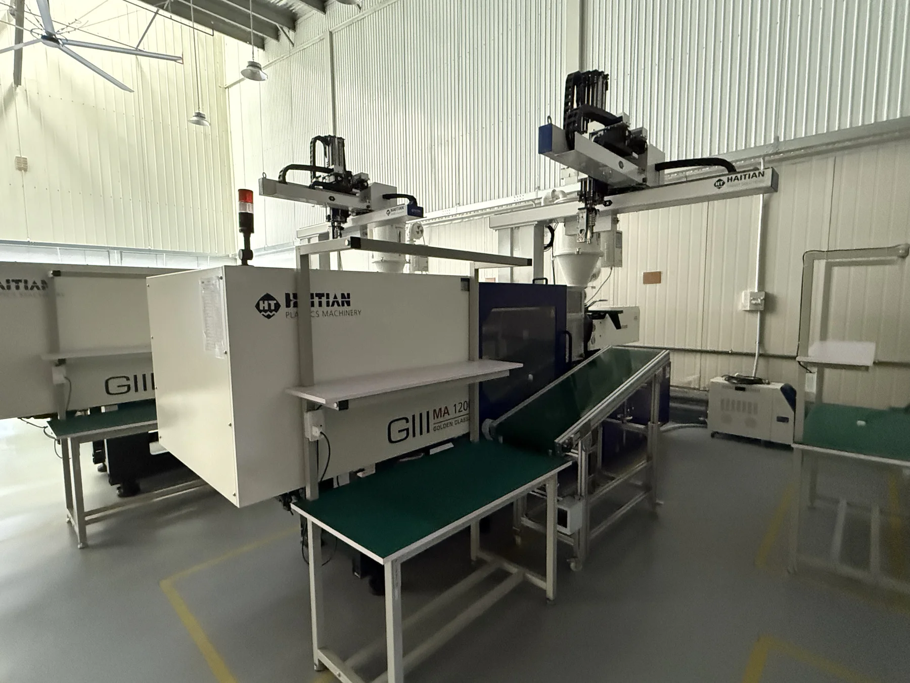 Haitian injection molding machines with robotic handling equipment